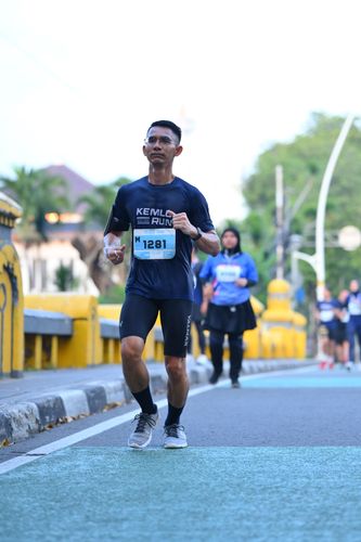 Race photo from KEMLU RUN 2025