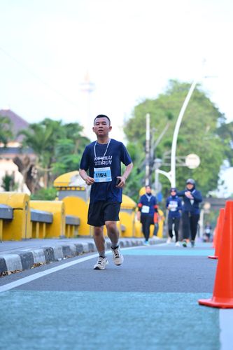 Race photo from KEMLU RUN 2025