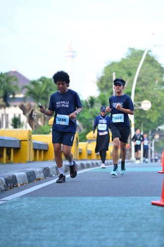 Race photo from KEMLU RUN 2025
