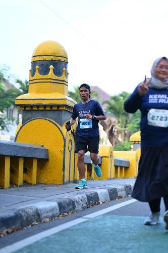 Race photo from KEMLU RUN 2025