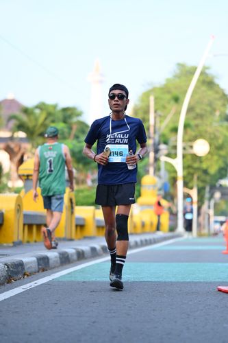 Race photo from KEMLU RUN 2025