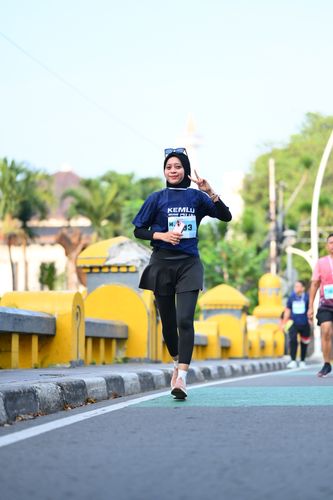 Race photo from KEMLU RUN 2025