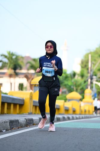 Race photo from KEMLU RUN 2025