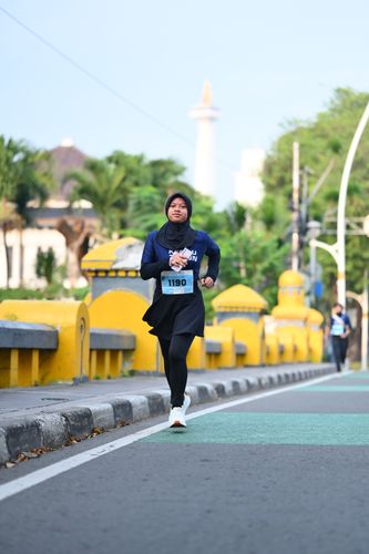 Race photo from KEMLU RUN 2025