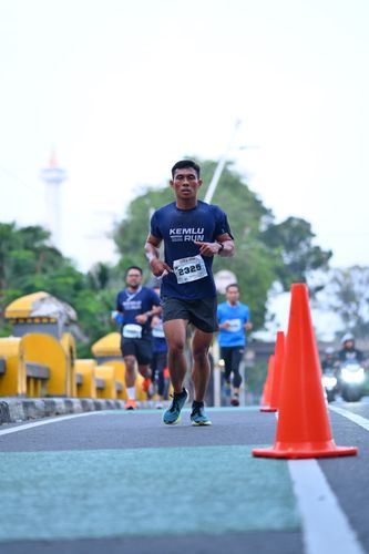 Race photo from KEMLU RUN 2025