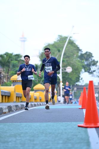 Race photo from KEMLU RUN 2025