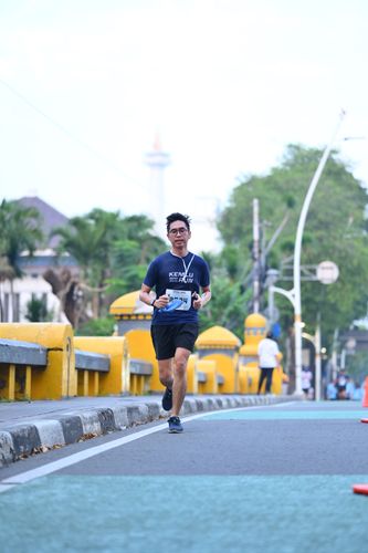 Race photo from KEMLU RUN 2025