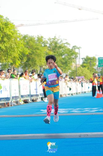 Race photo from PIK NITE RUN 2025
