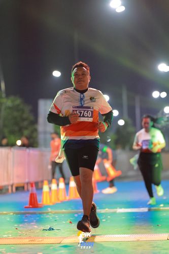 Race photo from PIK NITE RUN 2025