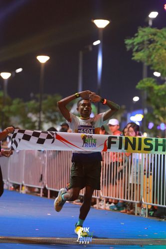Race photo from PIK NITE RUN 2025