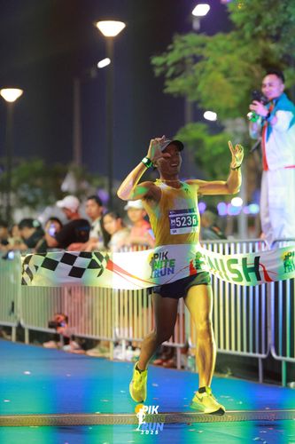 Race photo from PIK NITE RUN 2025