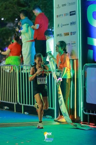 Race photo from PIK NITE RUN 2025