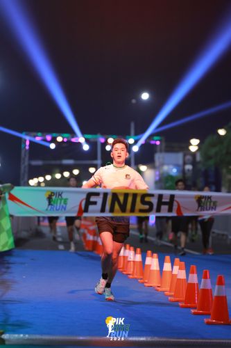 Race photo from PIK NITE RUN 2025