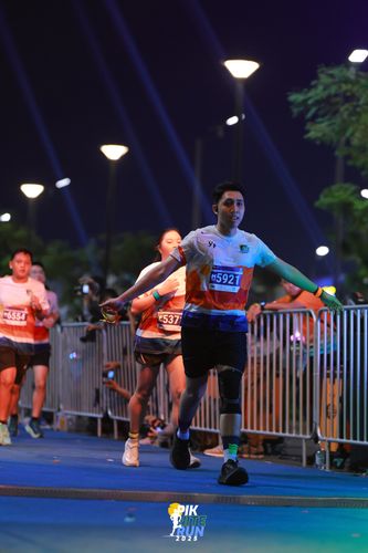 Race photo from PIK NITE RUN 2025