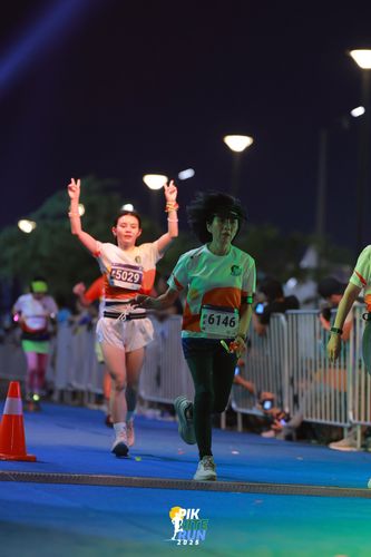 Race photo from PIK NITE RUN 2025