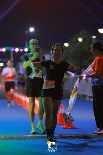 Race photo from PIK NITE RUN 2025