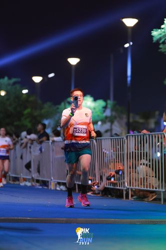 Race photo from PIK NITE RUN 2025