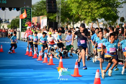 Race photo from PIK NITE RUN 2025