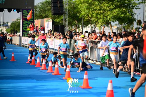 Race photo from PIK NITE RUN 2025