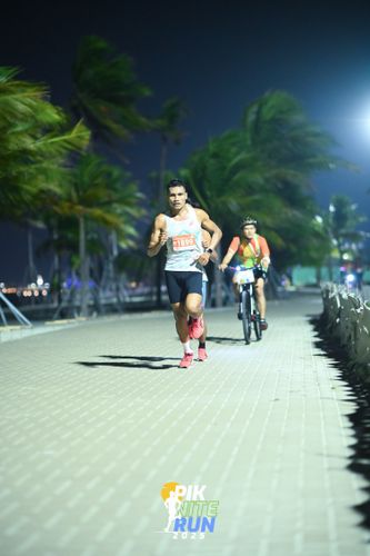 Race photo from PIK NITE RUN 2025
