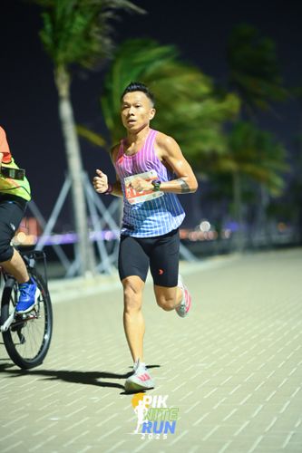 Race photo from PIK NITE RUN 2025