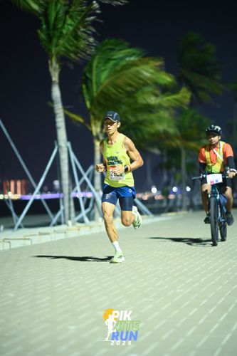 Race photo from PIK NITE RUN 2025