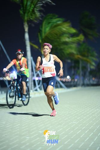 Race photo from PIK NITE RUN 2025