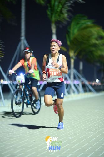 Race photo from PIK NITE RUN 2025