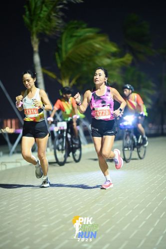 Race photo from PIK NITE RUN 2025