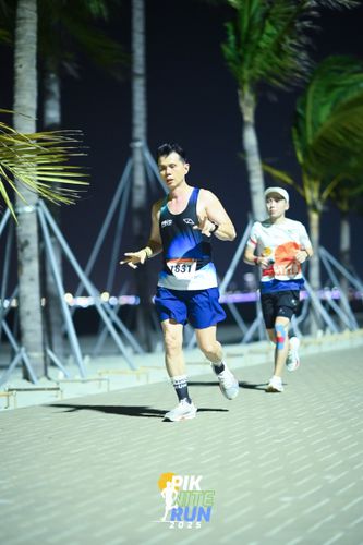 Race photo from PIK NITE RUN 2025