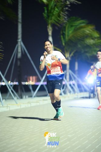 Race photo from PIK NITE RUN 2025