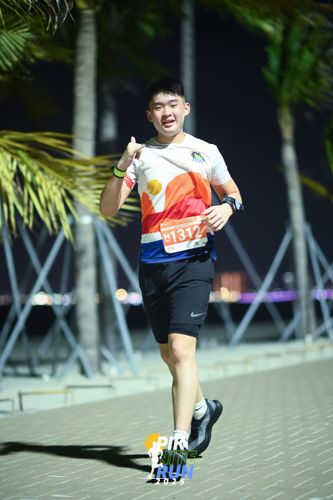 Race photo from PIK NITE RUN 2025