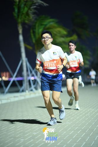 Race photo from PIK NITE RUN 2025