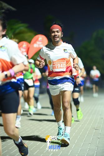 Race photo from PIK NITE RUN 2025