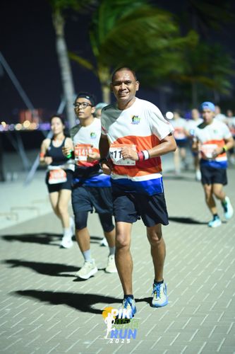 Race photo from PIK NITE RUN 2025
