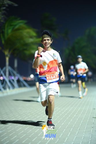 Race photo from PIK NITE RUN 2025