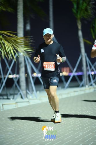 Race photo from PIK NITE RUN 2025