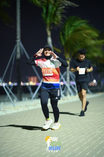 Race photo from PIK NITE RUN 2025