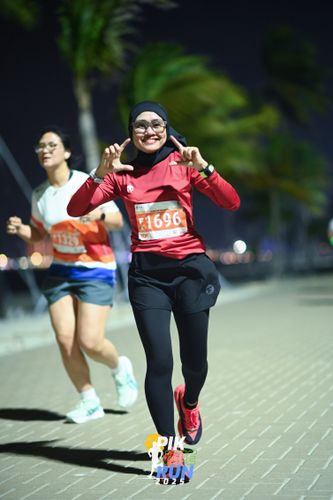 Race photo from PIK NITE RUN 2025