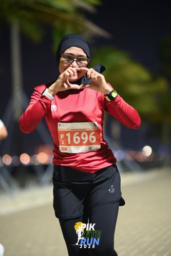 Race photo from PIK NITE RUN 2025