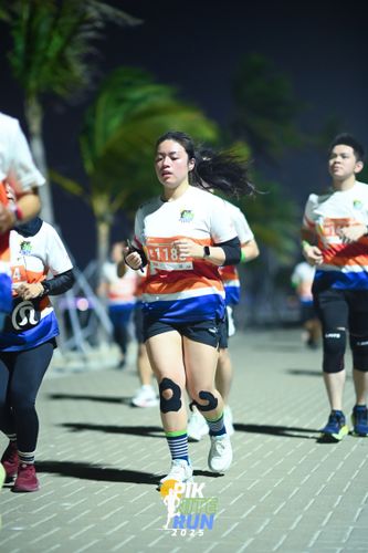 Race photo from PIK NITE RUN 2025