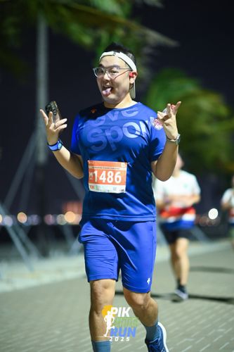 Race photo from PIK NITE RUN 2025