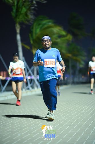 Race photo from PIK NITE RUN 2025