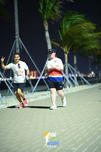 Race photo from PIK NITE RUN 2025