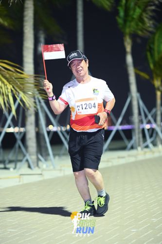 Race photo from PIK NITE RUN 2025
