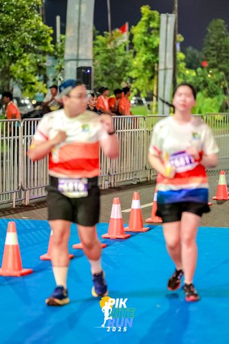 Race photo from PIK NITE RUN 2025