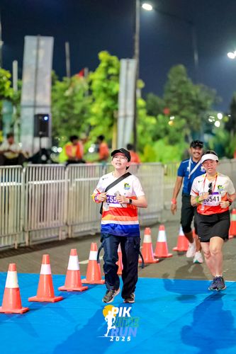 Race photo from PIK NITE RUN 2025