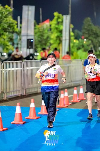 Race photo from PIK NITE RUN 2025