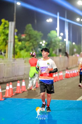 Race photo from PIK NITE RUN 2025