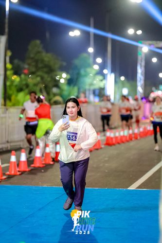 Race photo from PIK NITE RUN 2025